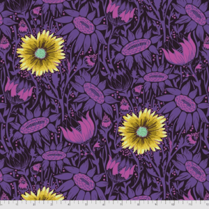 A purple and yellow floral pattern on fabric.