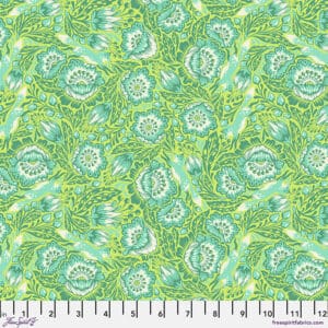 A green floral pattern is shown on fabric.