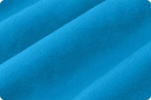 A close up of the blue fabric