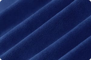 A close up of the blue fabric