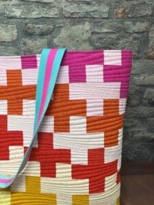 A close up of the handle of a bag