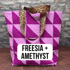A bag with a leopard print handle and a purple pattern.