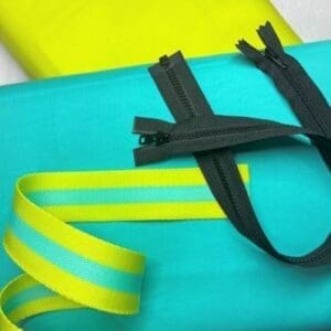 A close up of two zippers on top of each other