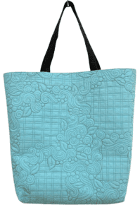 A blue bag with a pattern on it