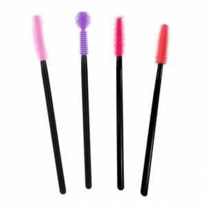 A group of four different colored mascara brushes.