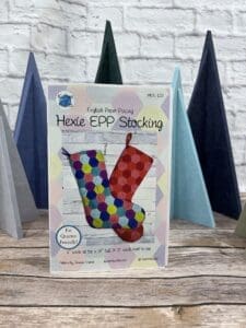 A colorful stocking sitting on top of a table.
