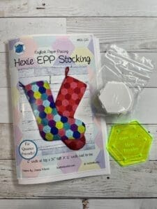 A stocking that is sitting on the floor.