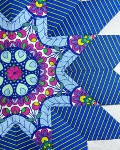 A close up of the design on a quilt