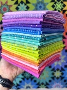 A stack of colorful fabric is shown.