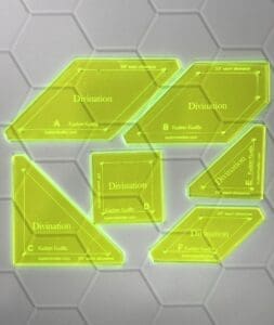 A set of six plastic templates for hexagons.