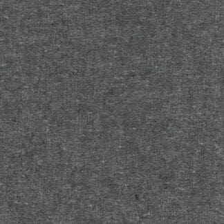 A gray fabric with some white dots on it