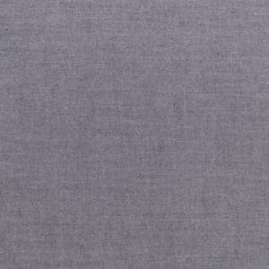 A gray fabric background with some white lines.