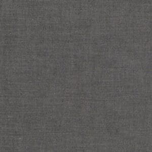 A gray fabric background with some white lines.
