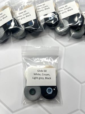 A bag of black and white contact lenses