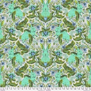 Intricate symmetrical pattern with green, blue, and beige tones.