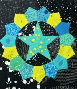 A colorful star and geometric shapes design on a dark background.