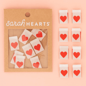 Sarah Hearts stickers featuring red hearts on white squares.
